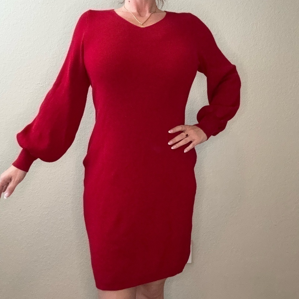 Red knit sweater dress size large. Knee length with bubble sleeves.